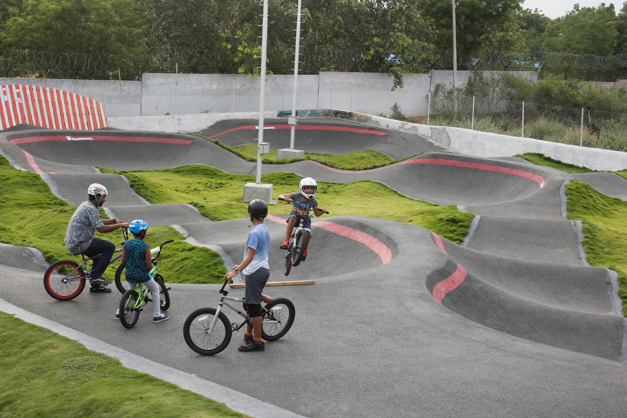 Coach teaching BMX at WallRide Park