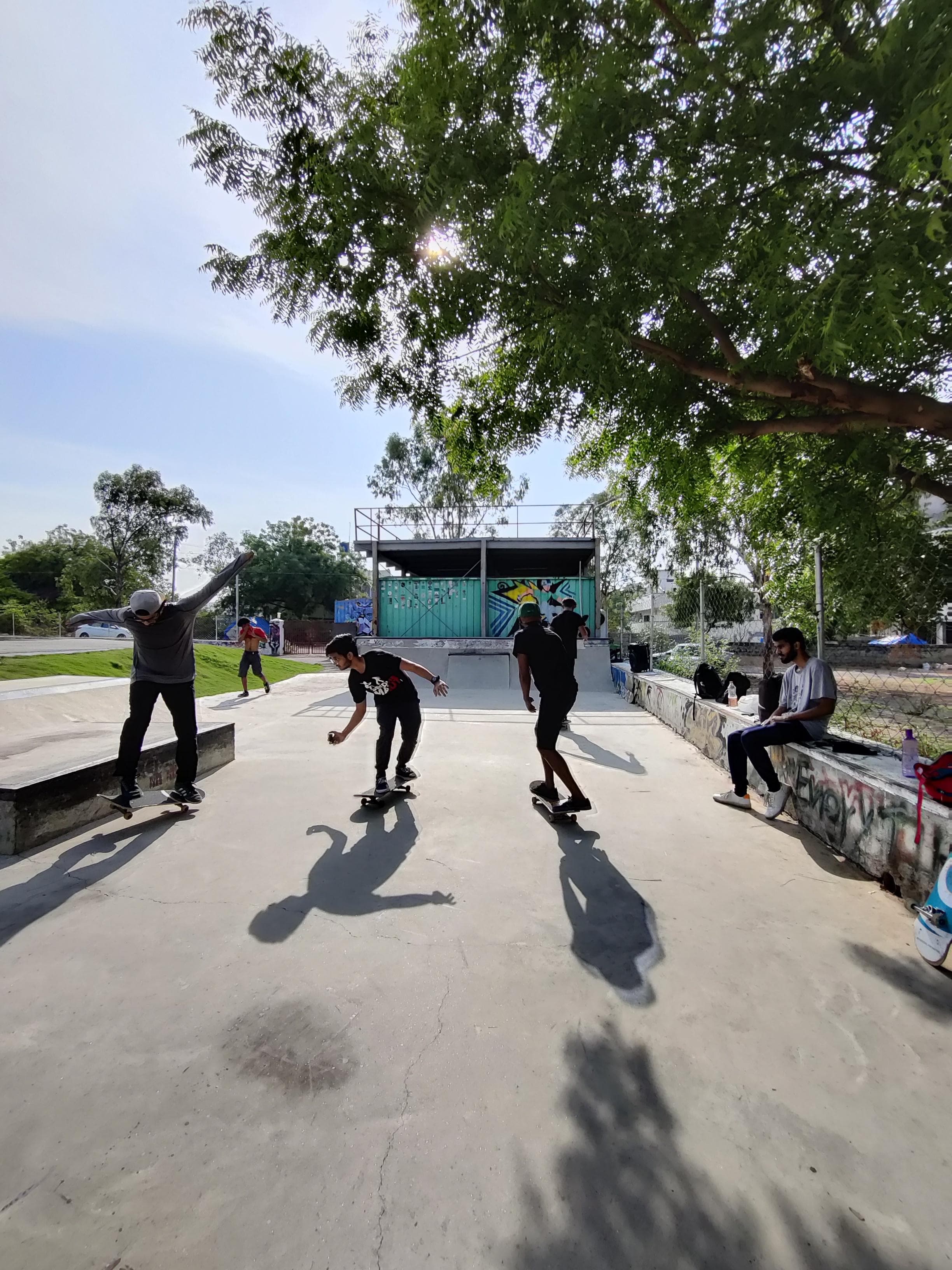 Skateboarders using the WallRide Park